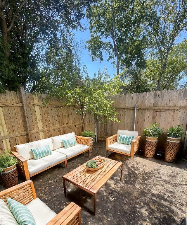 109 W Mockingbird Ln Unit A2, Austin, TX 78745 - fenced backyard with outdoor lounge area and a patio area