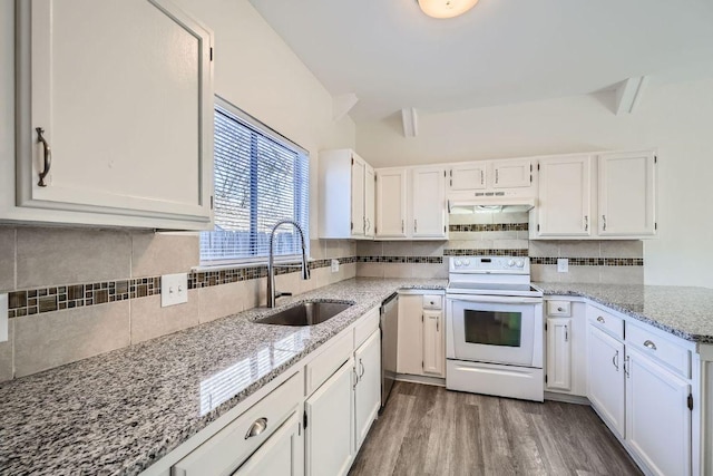 109 W Mockingbird Ln Unit A2, Austin, TX 78745 - kitchen with white range with electric cooktop, a sink, dishwasher, and white cabinets