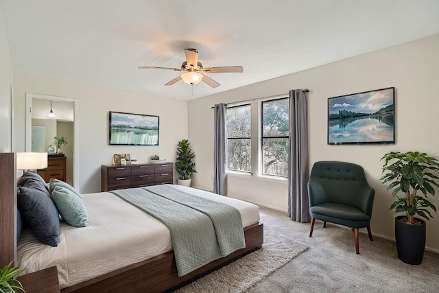 109 W Mockingbird Ln Unit A2, Austin, TX 78745 - bedroom featuring light carpet, ceiling fan, and baseboards