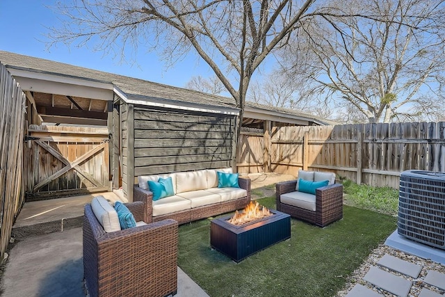 109 W Mockingbird Ln Unit A2, Austin, TX 78745 - view of patio with cooling unit and an outdoor living space with a fire pit