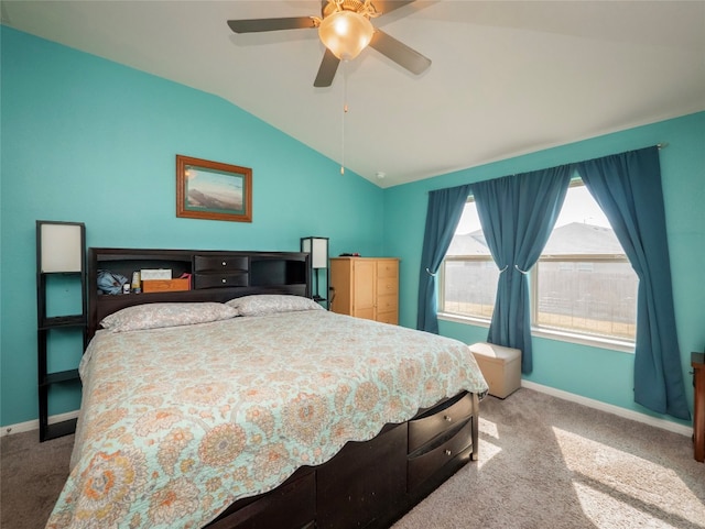 bedroom featuring carpet floors, lofted ceiling, and ceiling fan