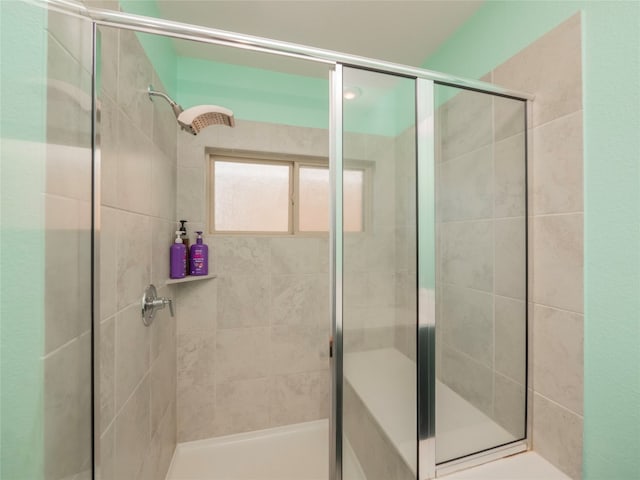 bathroom featuring an enclosed shower