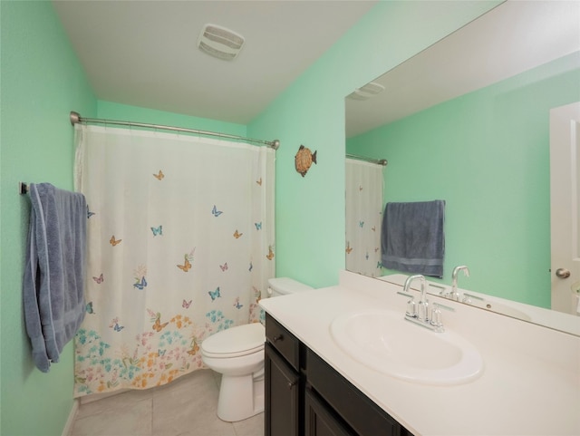 bathroom featuring a shower with curtain, vanity, toilet, and tile patterned floors