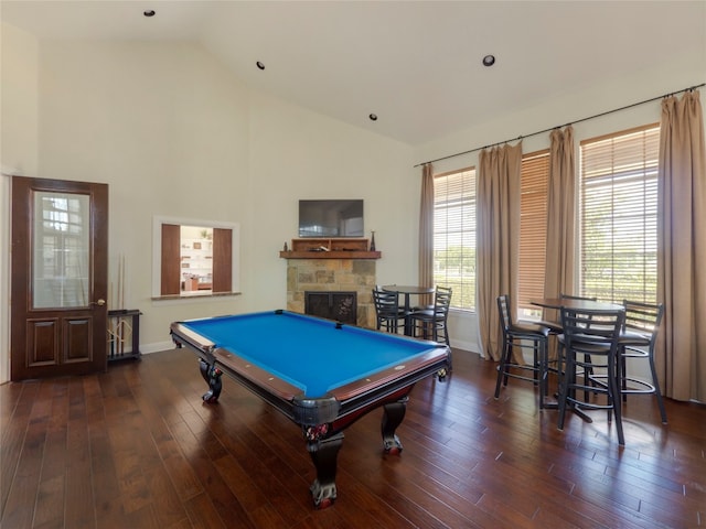 rec room with a fireplace, dark hardwood / wood-style floors, pool table, and high vaulted ceiling