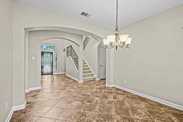 interior space with an inviting chandelier