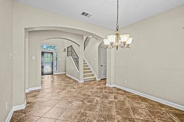 interior space featuring a chandelier