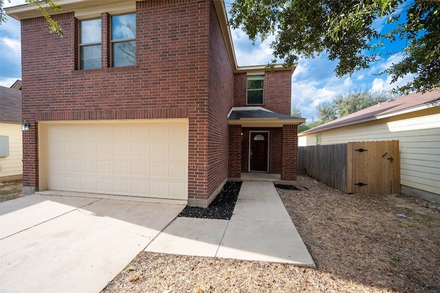 front of property with a garage