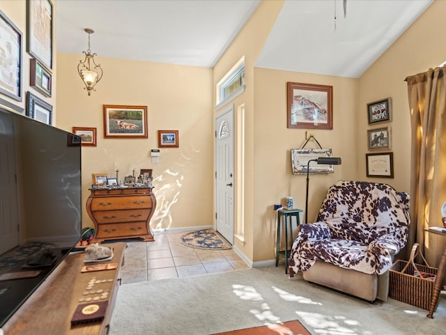 tiled entrance foyer with lofted ceiling