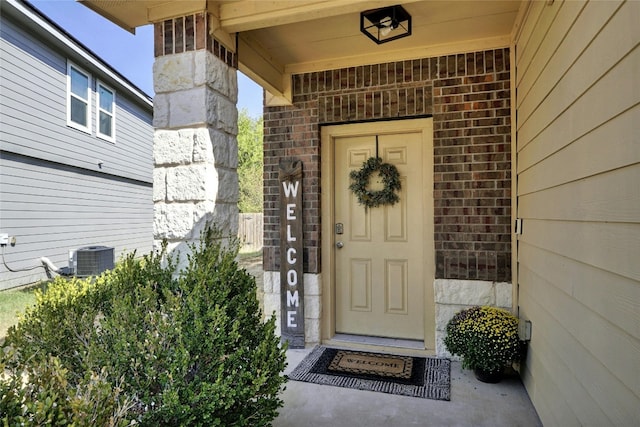 entrance to property featuring central AC