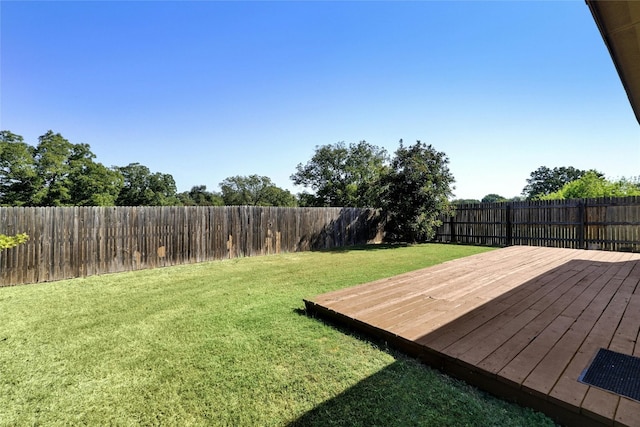 view of yard with a wooden deck