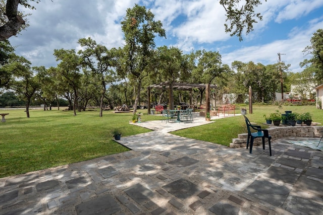 surrounding community with a patio, a pergola, and a lawn