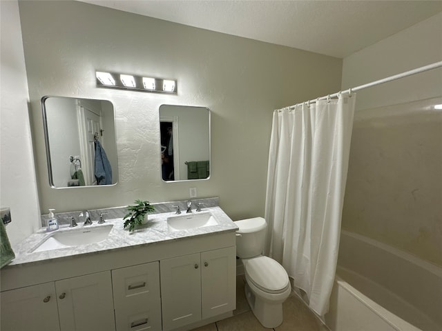 full bathroom with shower / tub combo, a textured ceiling, toilet, vanity, and tile patterned floors