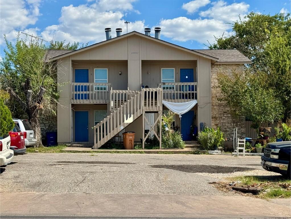 10007 Brownie Dr, Austin, TX 78753 - view of building exterior with stairs