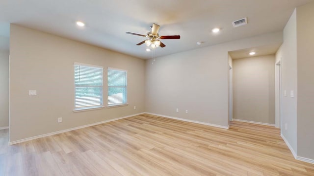 unfurnished room with light hardwood / wood-style floors and ceiling fan