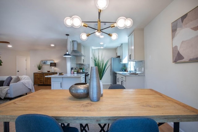 dining area featuring an inviting chandelier