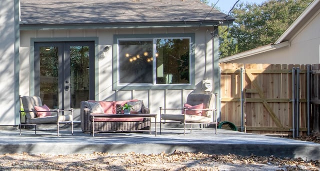 exterior space featuring outdoor lounge area and french doors