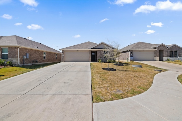 ranch-style home with a front yard and a garage