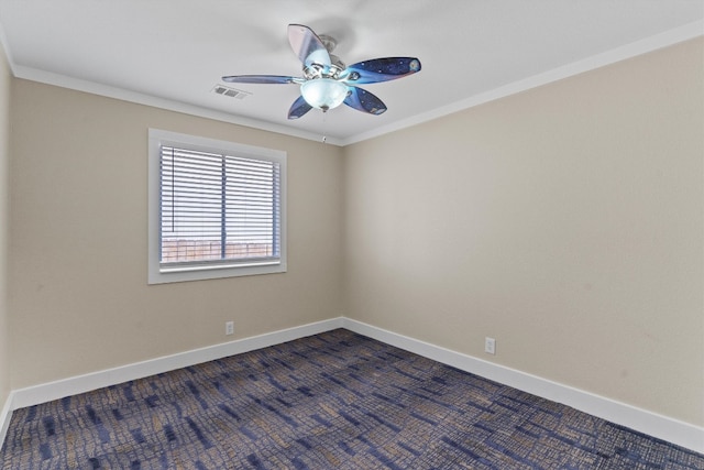 spare room with crown molding and ceiling fan