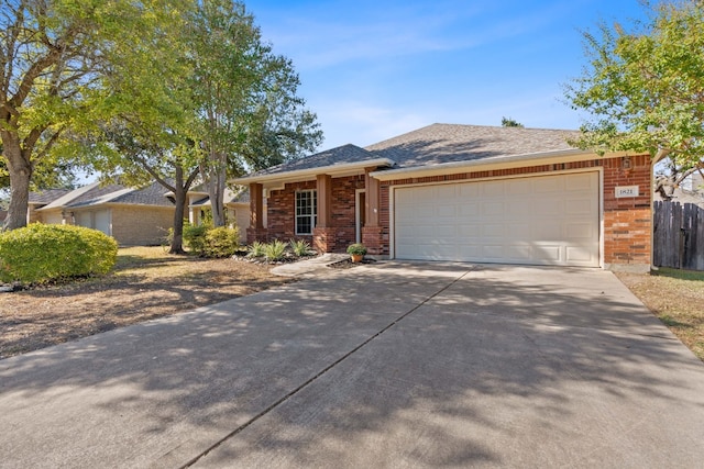 ranch-style home with a garage