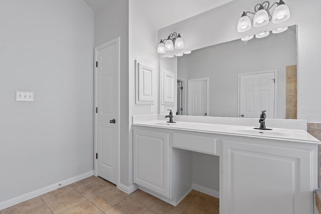 bathroom with vanity and tile patterned floors