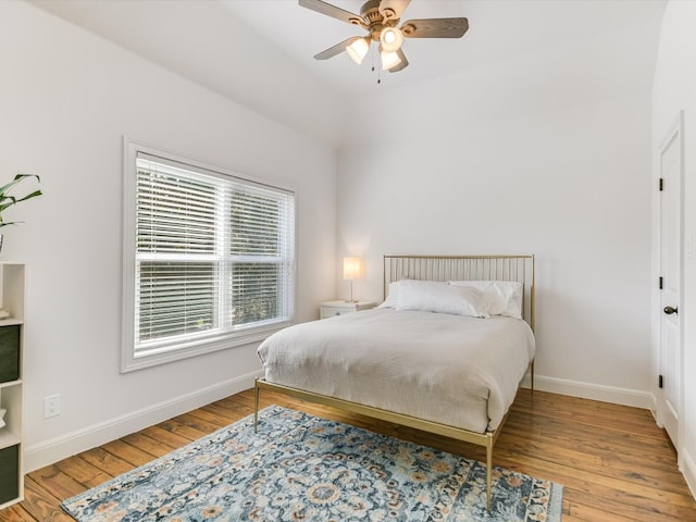 bedroom featuring light wood-type flooring and ceiling fan