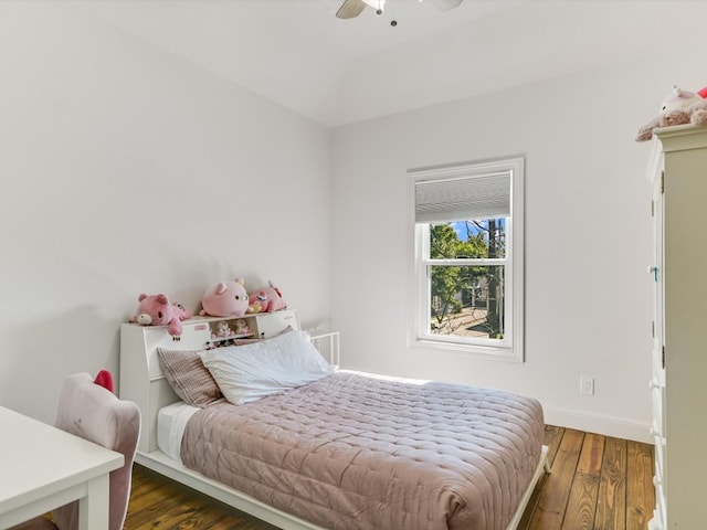 bedroom featuring dark hardwood / wood-style flooring and ceiling fan