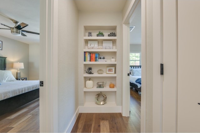 corridor featuring hardwood / wood-style flooring