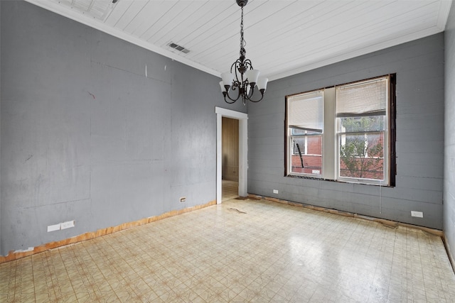 empty room featuring crown molding, an inviting chandelier, and wooden ceiling