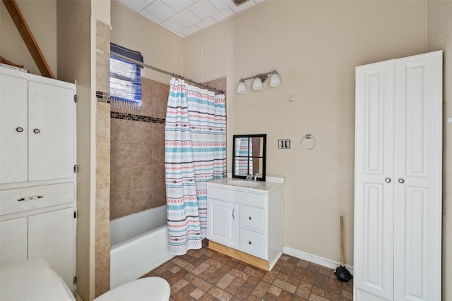 full bathroom with vanity, toilet, and shower / bath combination with curtain