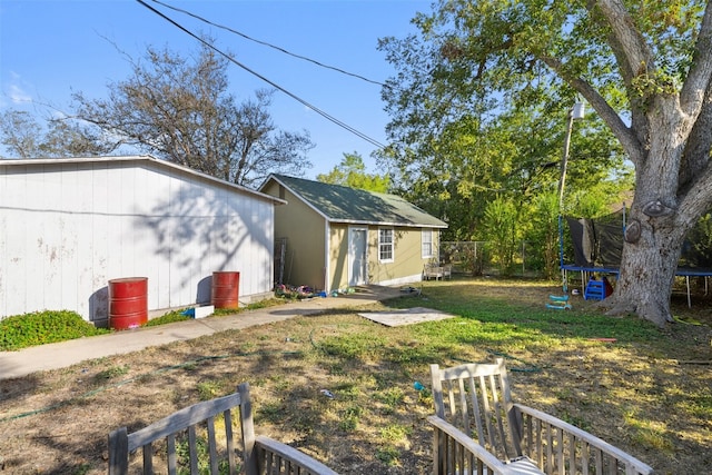 view of yard featuring a trampoline