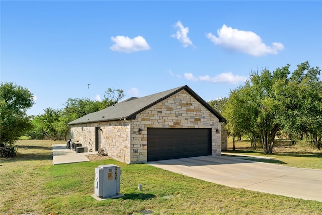 exterior space featuring a yard and a garage