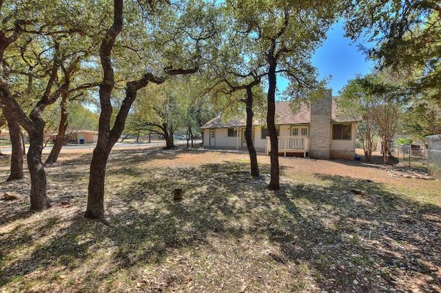 view of yard featuring a deck