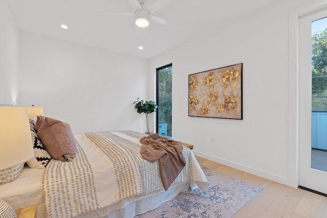 bedroom featuring ceiling fan and light wood-type flooring