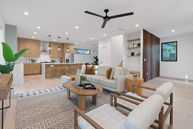 2704 Canterbury St Unit A, Austin, TX 78702 - living area featuring recessed lighting, a ceiling fan, visible vents, and light wood-style floors