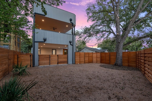 2704 Canterbury St Unit A, Austin, TX 78702 - rear view of house featuring a fenced backyard and a balcony