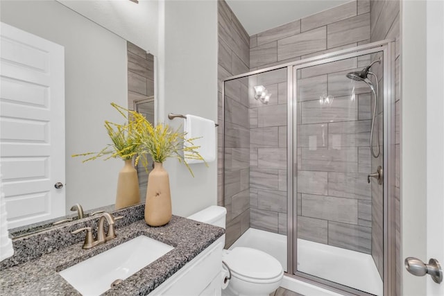 110 Magona Trl, Georgetown, TX 78628 - bathroom featuring vanity, toilet, and a stall shower