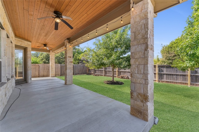 view of patio featuring ceiling fan