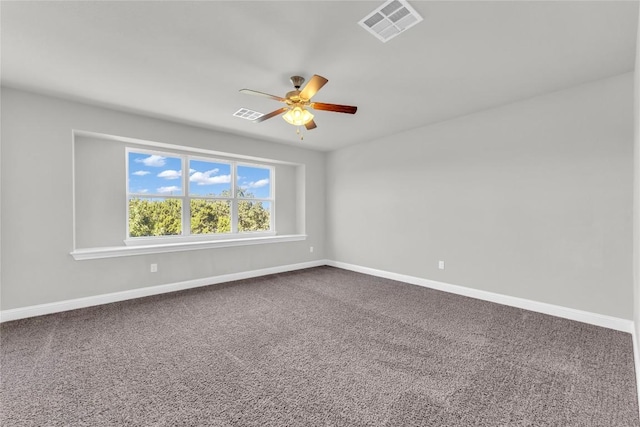 110 Magona Trl, Georgetown, TX 78628 - unfurnished room with ceiling fan, visible vents, baseboards, and dark carpet