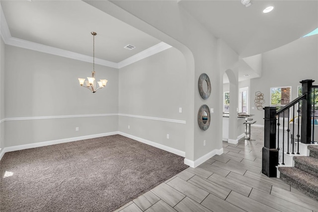 110 Magona Trl, Georgetown, TX 78628 - interior space with visible vents, arched walkways, baseboards, a notable chandelier, and stairs
