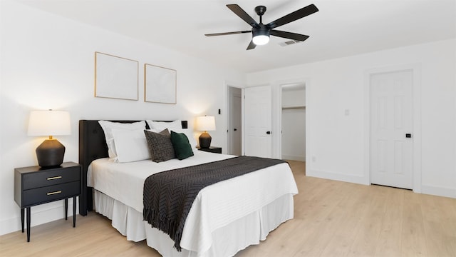 bedroom featuring ceiling fan and wood-type flooring