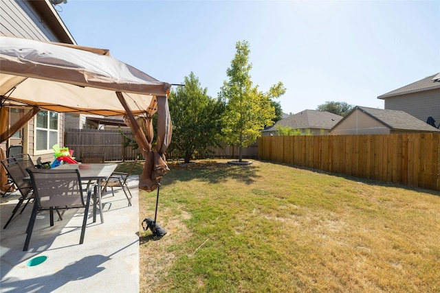 view of yard featuring a gazebo and a patio area