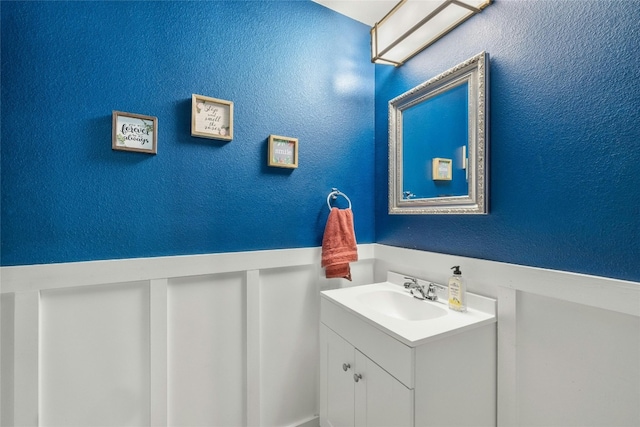 104 Bufflehead Ln, Leander, TX 78641 - bathroom featuring vanity and a textured wall