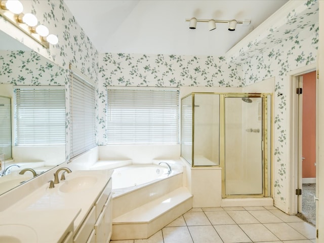 bathroom with shower with separate bathtub, tile patterned floors, and plenty of natural light