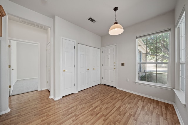 foyer featuring light hardwood / wood-style flooring