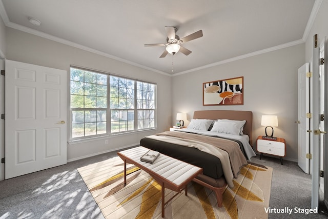 carpeted bedroom with ceiling fan and ornamental molding