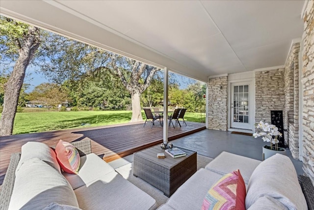 view of patio / terrace with an outdoor living space and a wooden deck