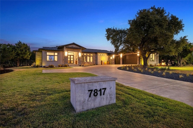 view of front of house with a yard