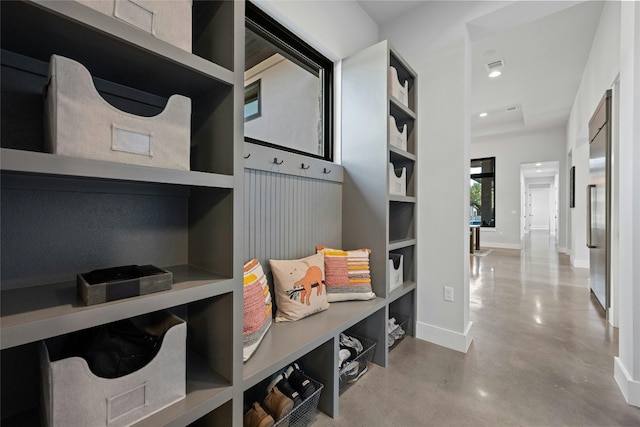 mudroom featuring built in features