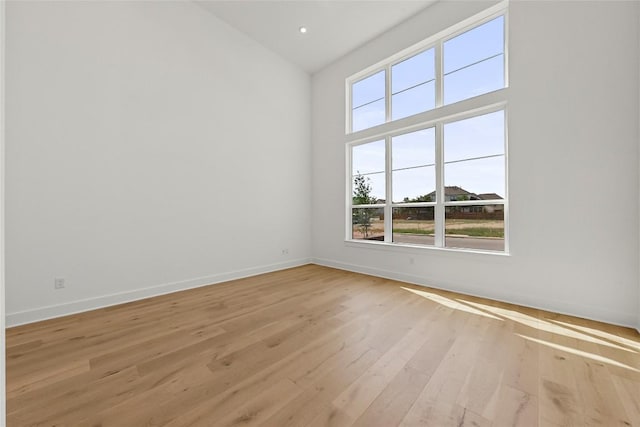 2305 Shane Ranch Dr, Cedar Park, TX 78641 - empty room featuring light wood-style flooring and high vaulted ceiling