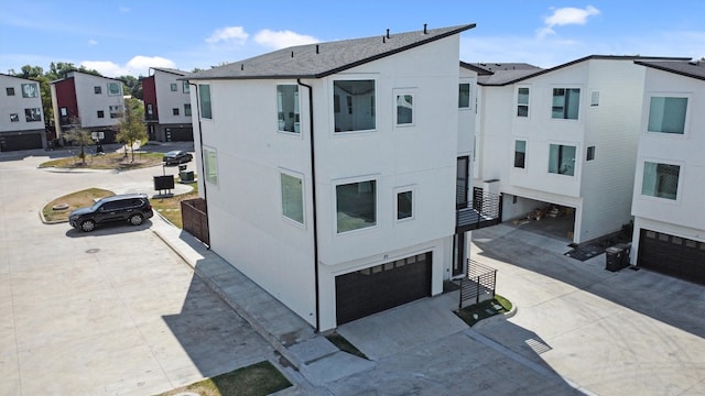 view of building exterior featuring a garage